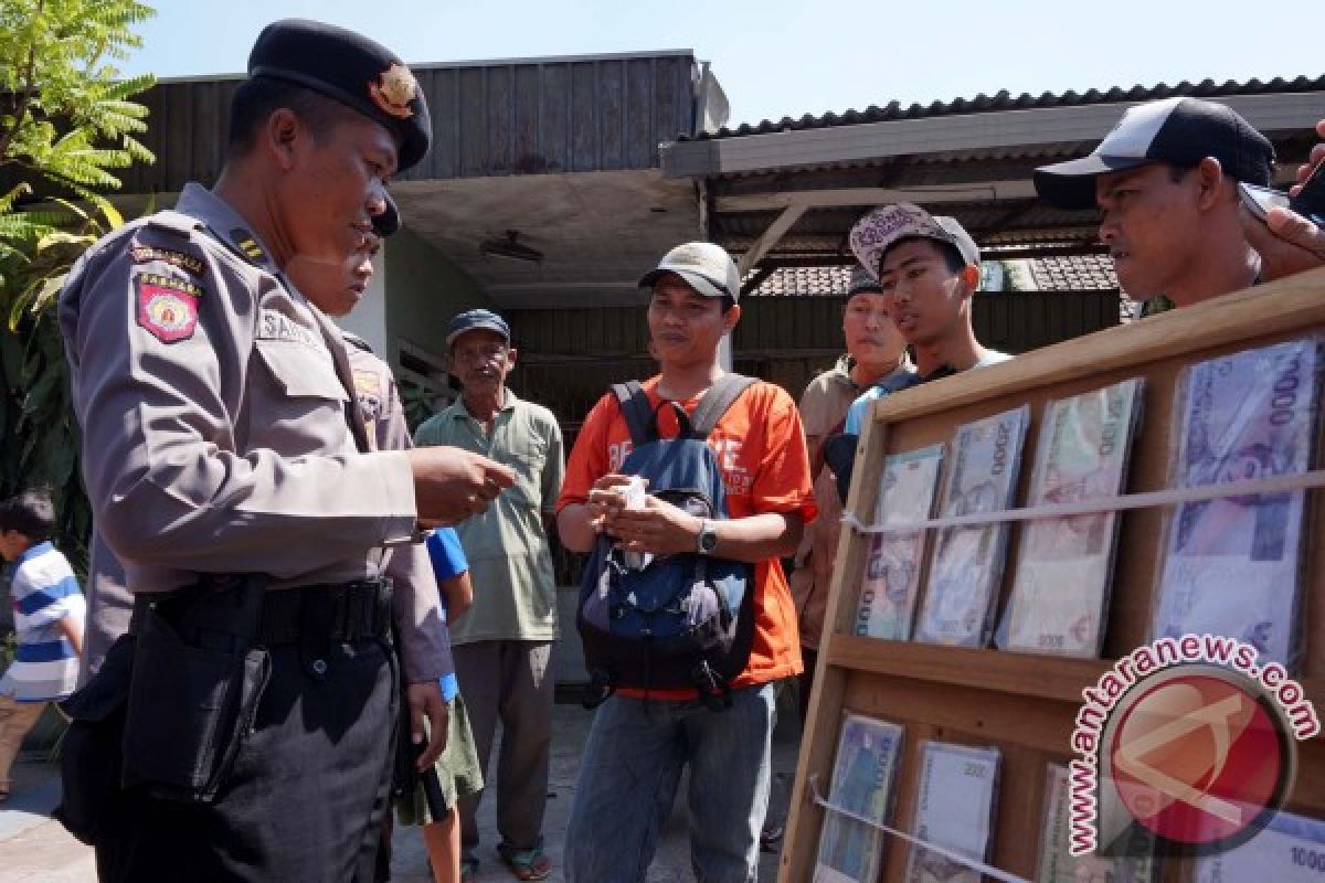 Polres Pasuruan Razia Jasa Penukaran Uang