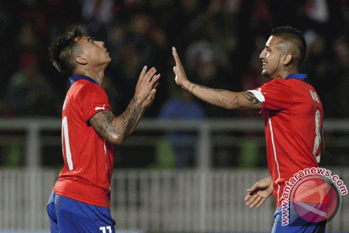 Chile tundukkan Kamerun 2-0 berkat gol Vidal dan Vargas