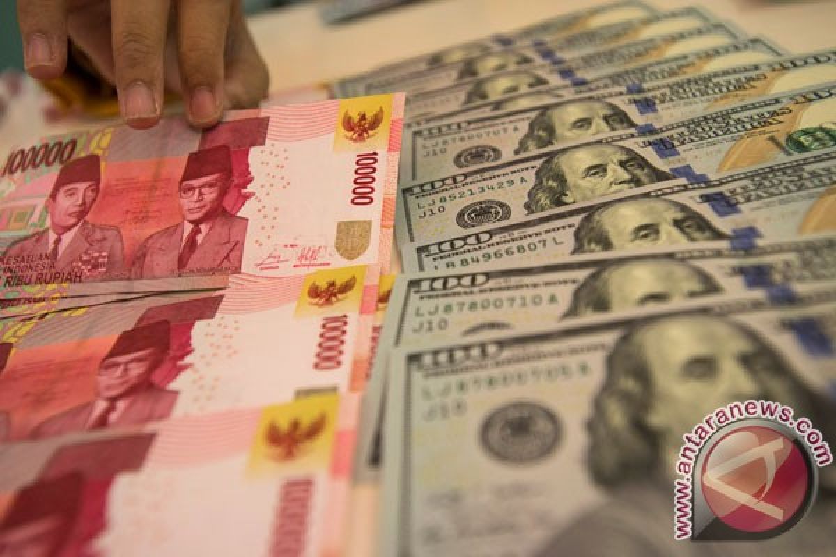 Rupiah Selasa sore melemah menjadi Rp14.097