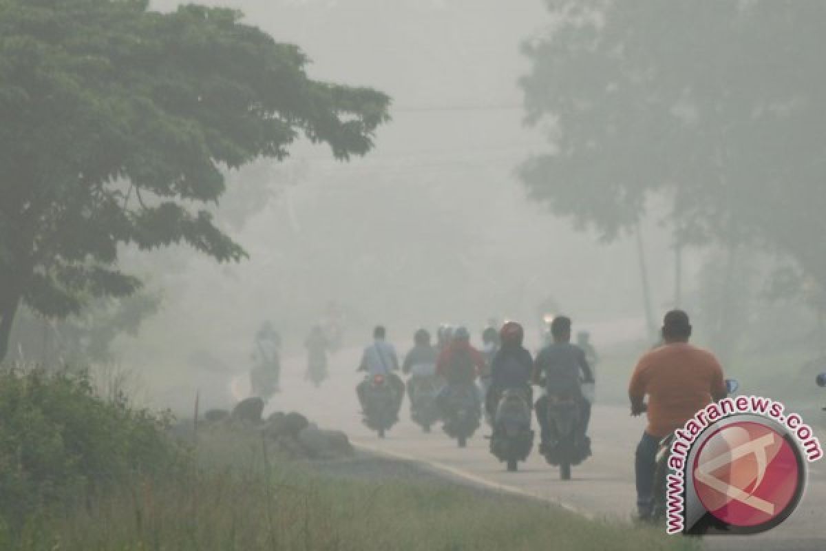 Warga Pekanbaru terpaksa hirup udara bercampur asap