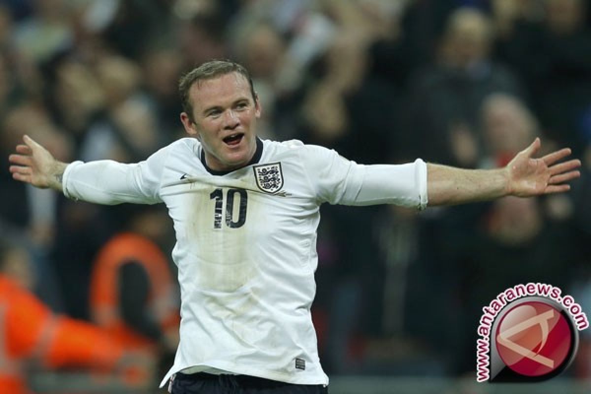 Rooney tidak silau dengan predikat raja gol