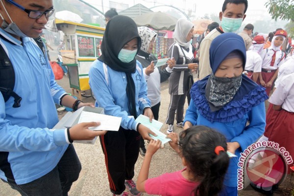 BP3AKB Banjar Bagi Seribu Masker Cegah Asap