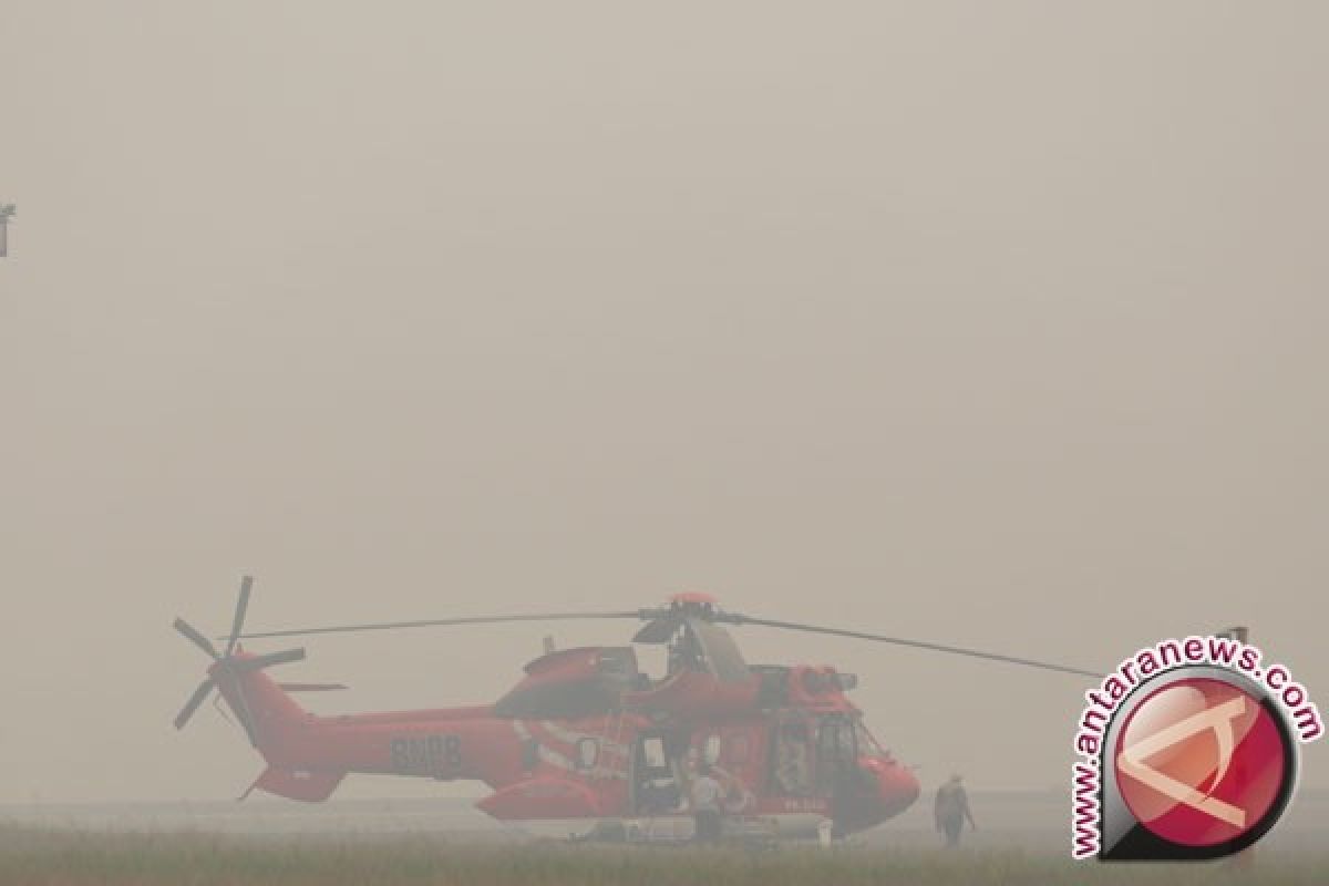 16 helikopter diterjunkan redam asap kebakaran Sumsel