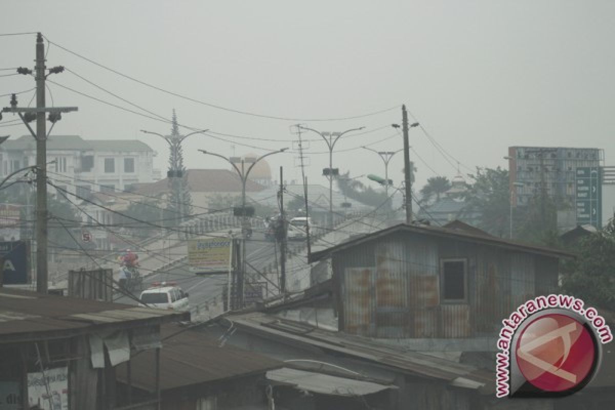 Kota Banjarmasin Diselimuti Kabut Tebal 