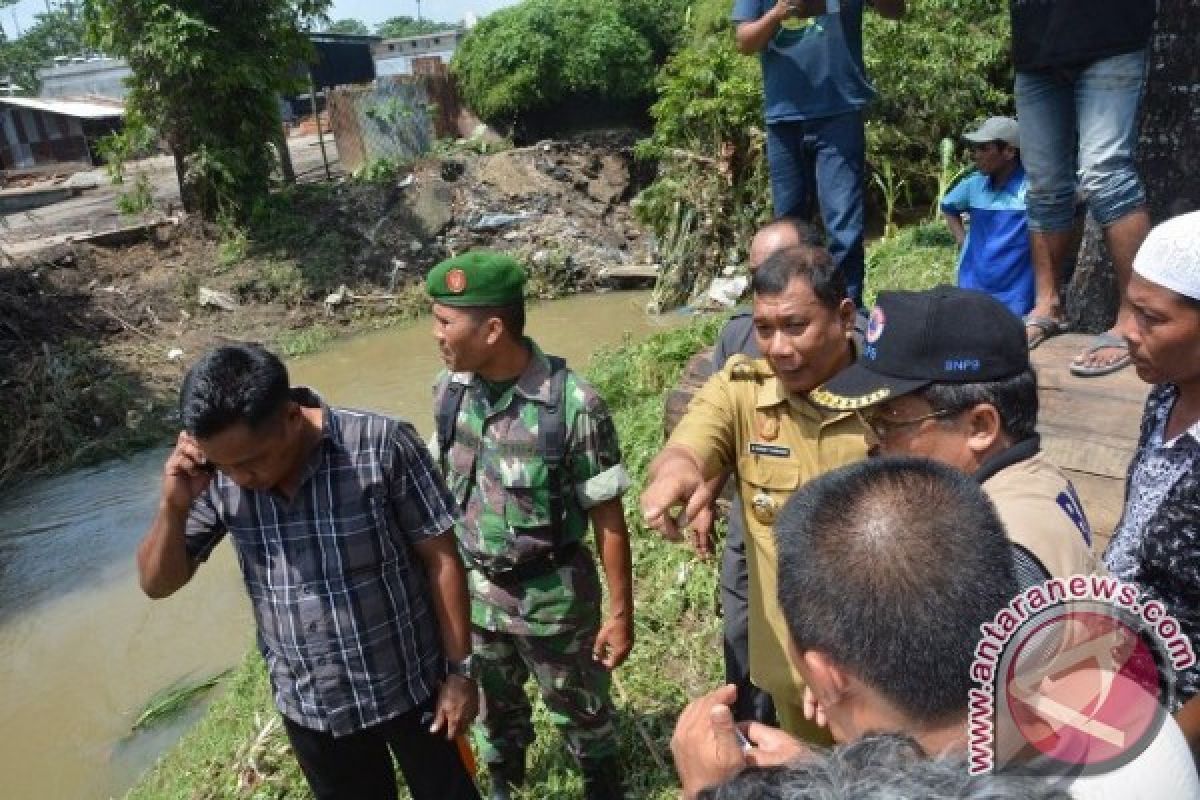 Bupati Tinjau Lokasi Banjir di Sunggal