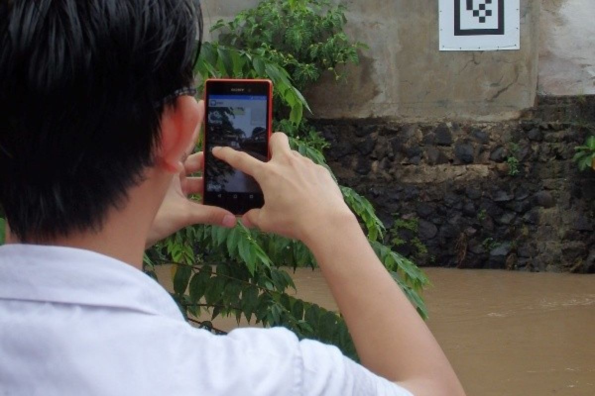 Fujitsu uji coba sistem pengukuran muka air sungai gunakan smartphone dan AR