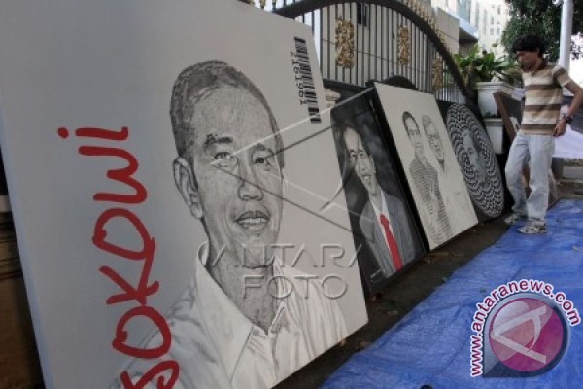 Ade Komarudin Beli Lukisan Bergambar Jokowi