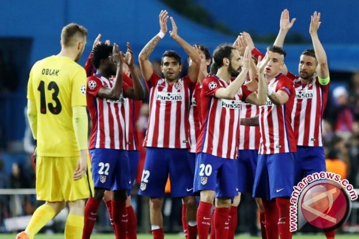 Atletico Madrid Bekuk Sevilla 2-0