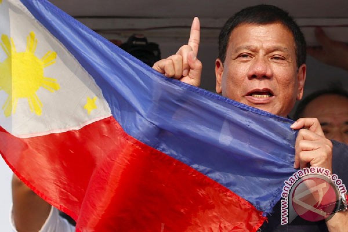 Duterte, "The Punisher", sworn in as Philippines` President