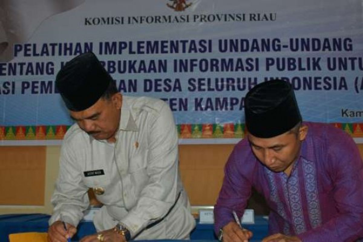 Bupati dan Ketua Komisi Informasi Riau Teken MoU