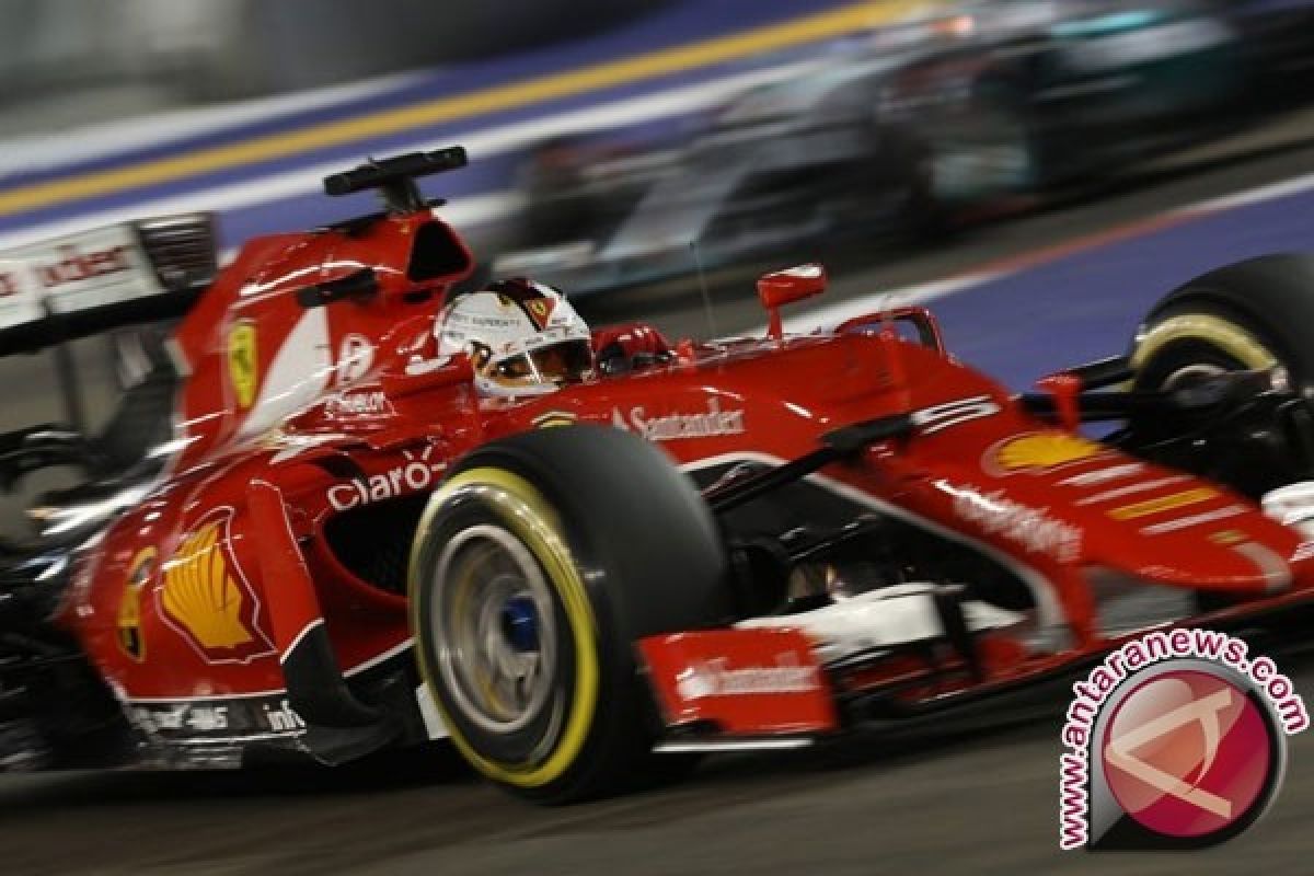 Pebalap Ferrari Vettel start pertama GP China