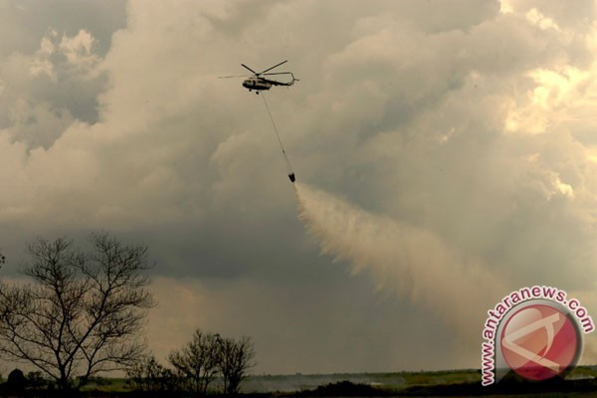 MI-8 helicopter deployed in Riau to put out wildfires