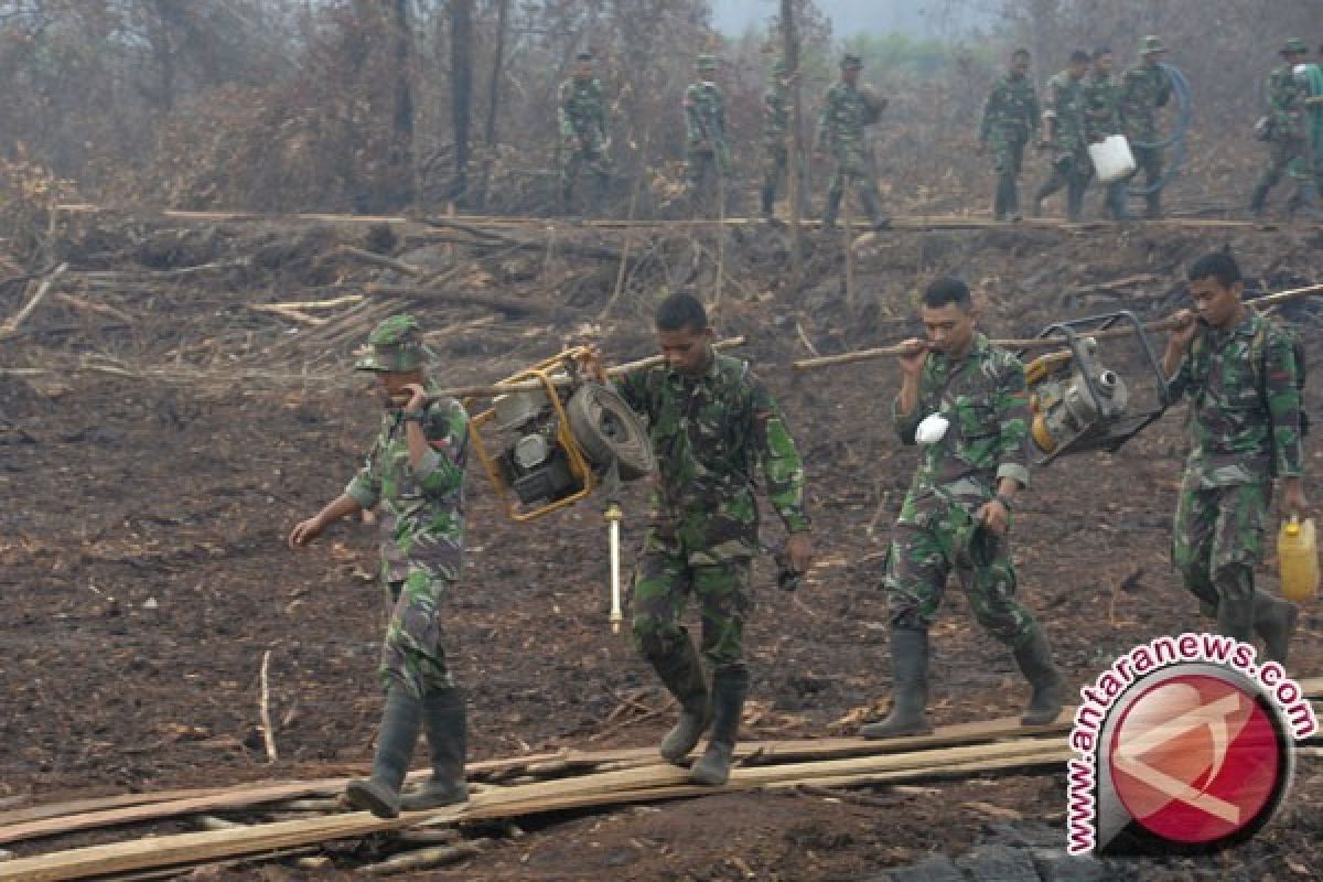  Korem 044/Garuda Dempo temukan cairan pemadat lahan gambut