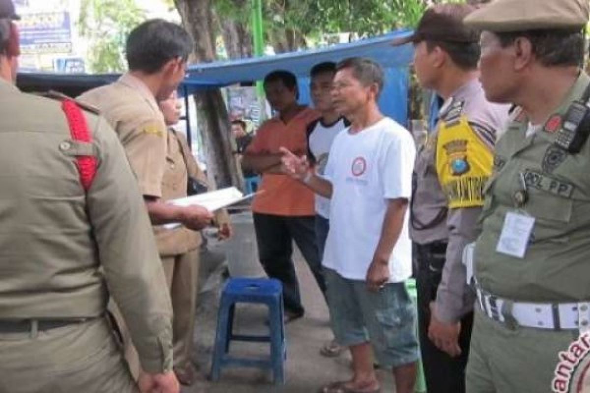 Keindahan Pusat Kota Kuansing Terancam Pedagang Yang Memakan Badan Jalan
