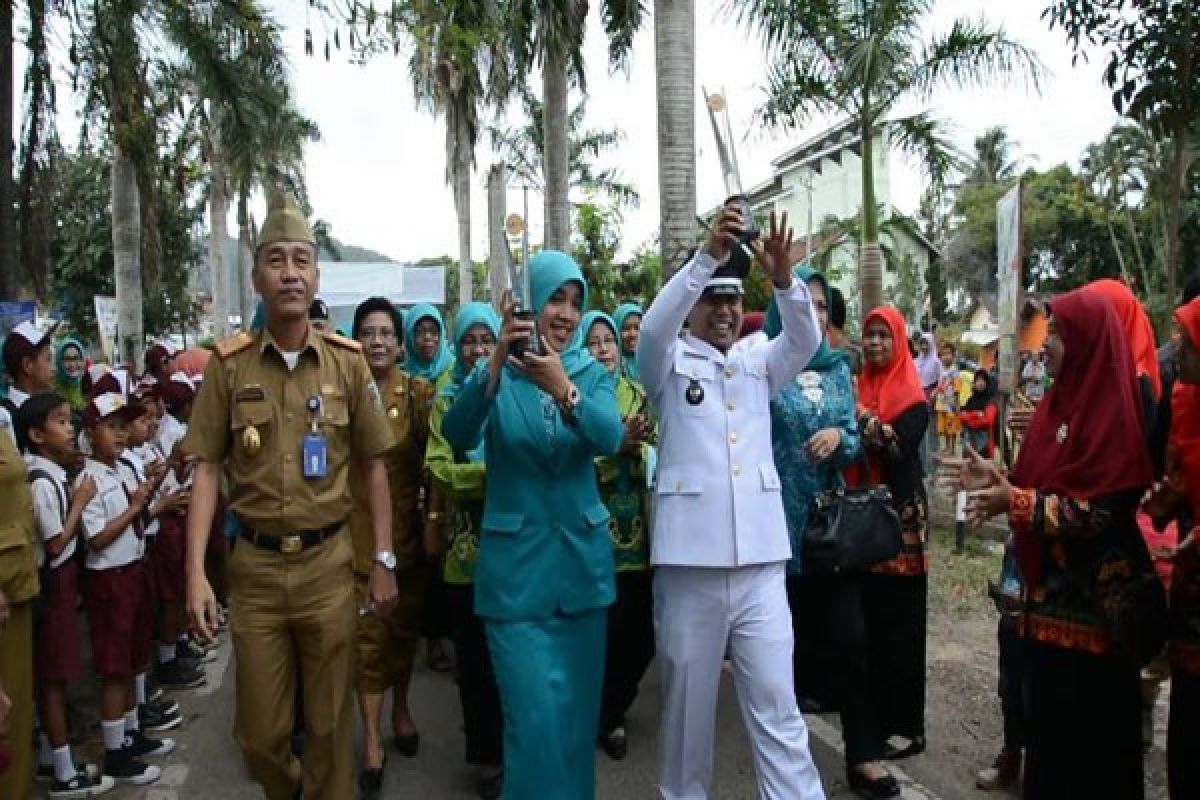 Warga Hanura Sambut Meriah Juara Lomba Desa Nasional 