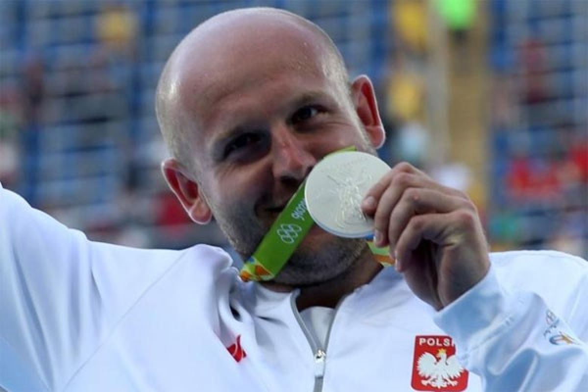 Bantu anak sakit kanker, atlet Olimpiade jual medali