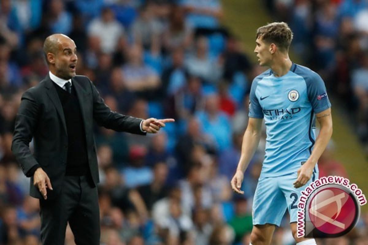 John Stones tak menyesal gagal ke Chelsea karena ada Pep di City