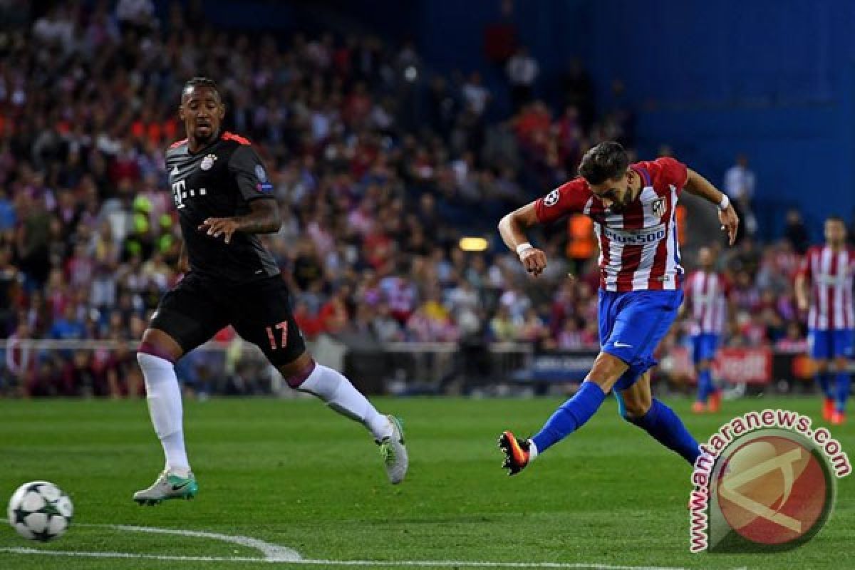 Gol Carrasco ke gawang Bayern antar Atletico ke puncak klasemen