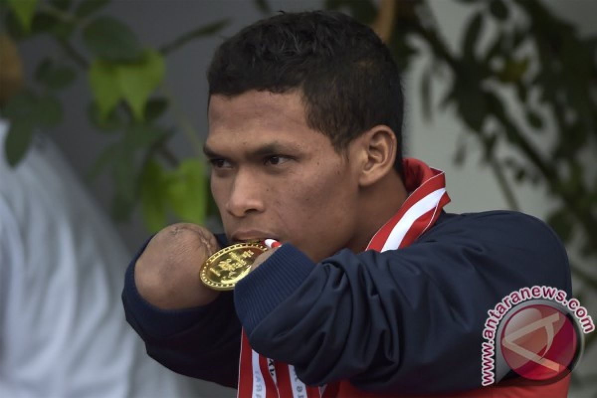 PEPARNAS - Miswan, atlet sekaligus penjahit keluarga Presiden Jokowi