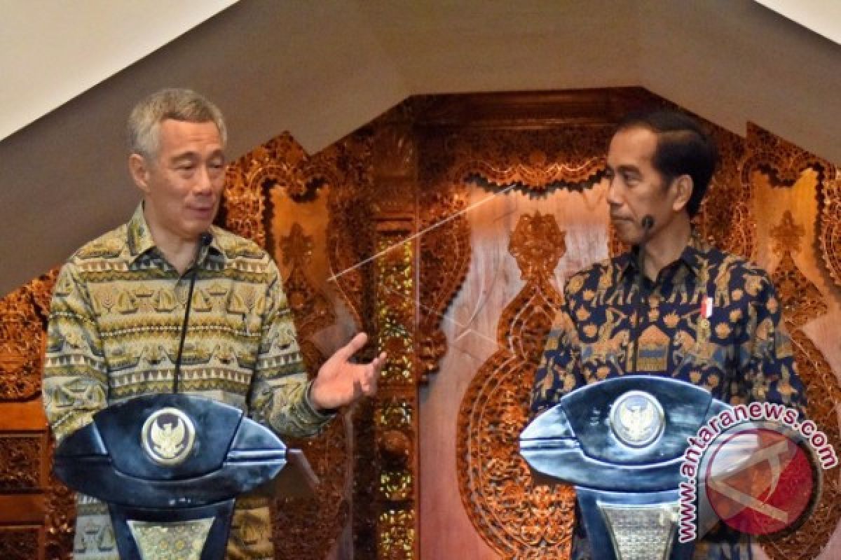 Jokowi-Lee Lakukan Diplomasi Batik