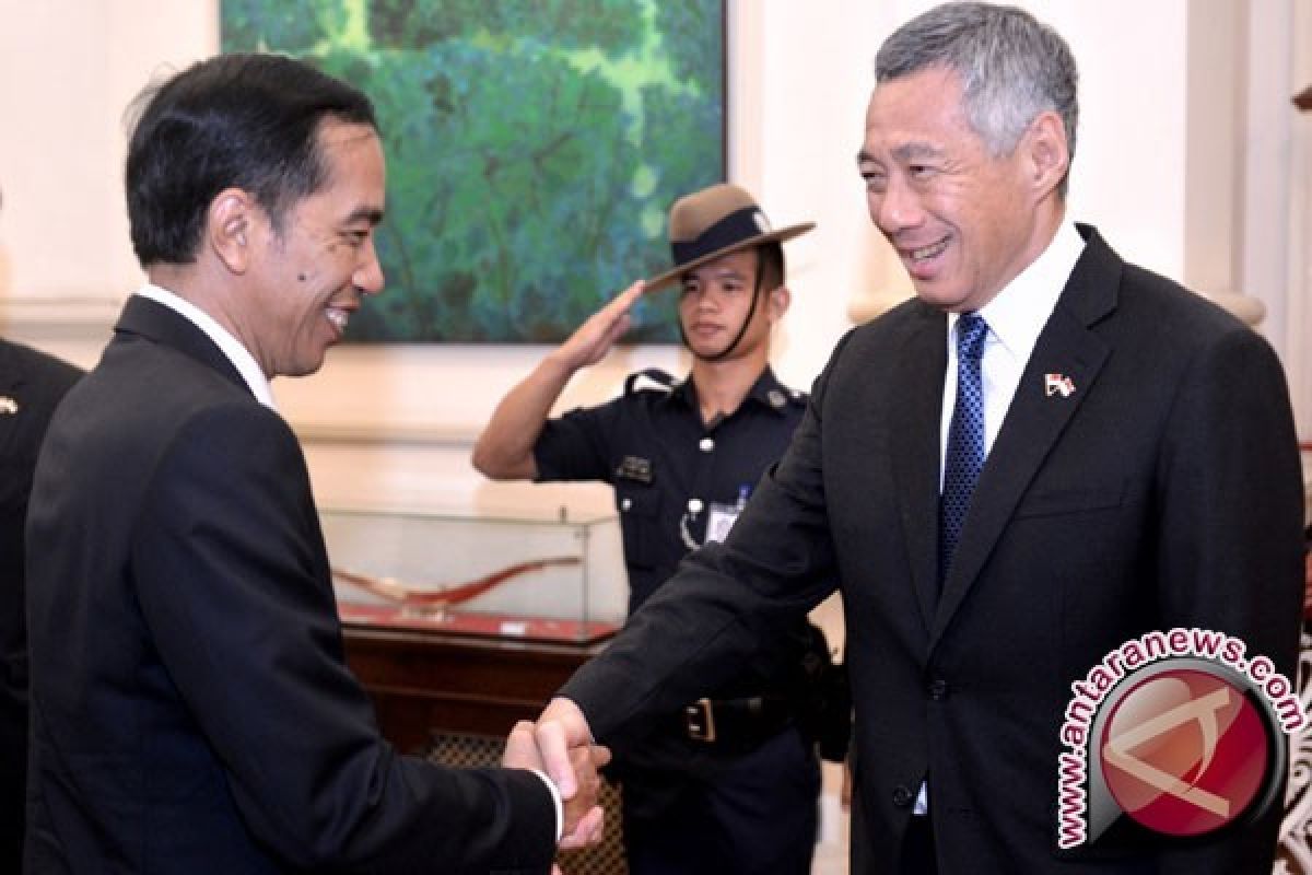Jokowi-Lee Lakukan Diplomasi Batik