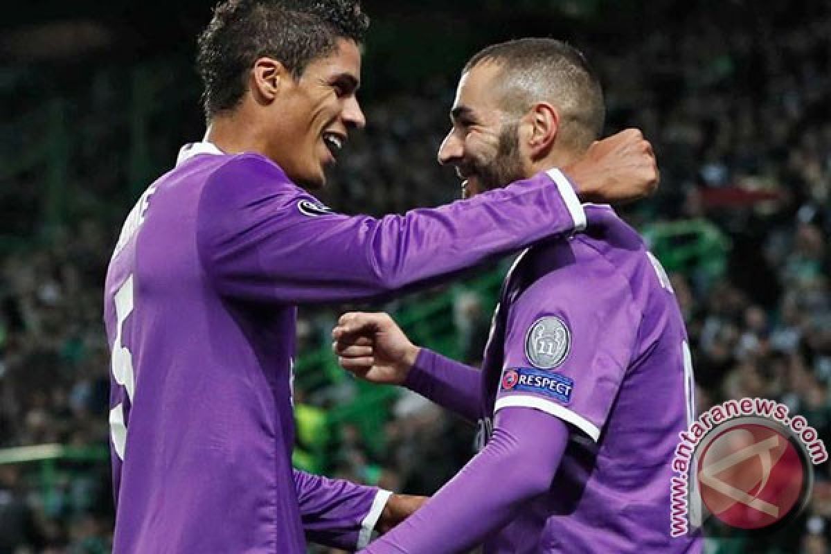 Tandukan larut Benzema bawa Real menang atas Sporting