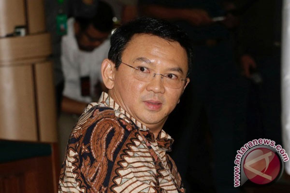 Ahok cries at first trial