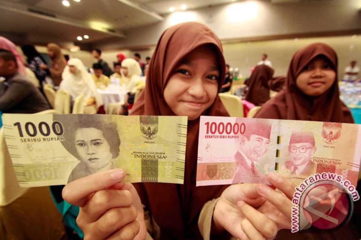 Rupiah Rabu sore melemah tipis ke Rp13.345