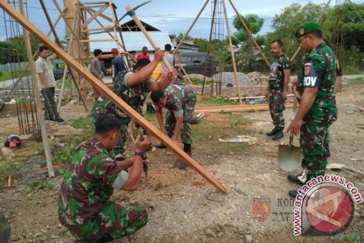 Prajurit Bersama Masyarakat Bangun Rumah Ibadah