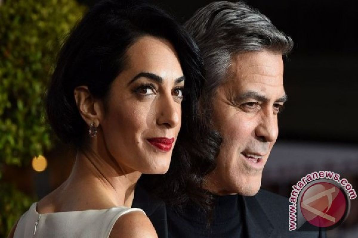 George dan Amal Clooney ke Italia bersama si kembar