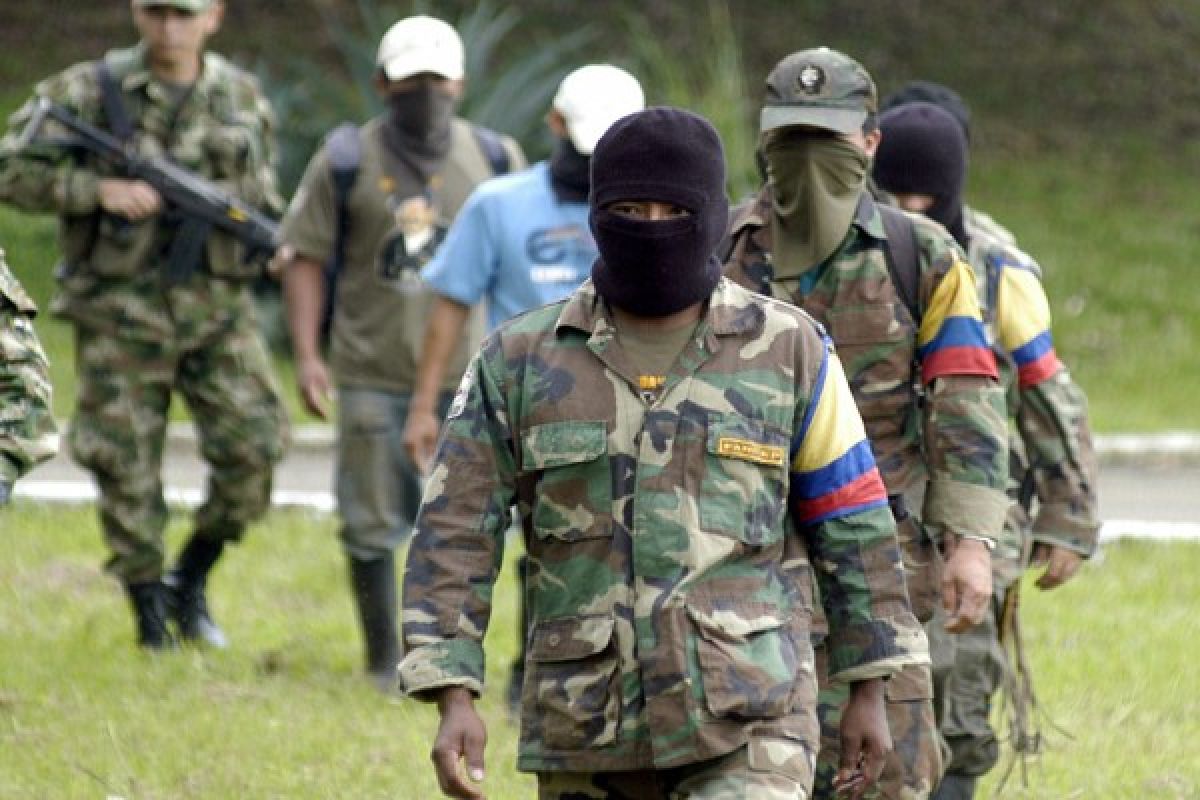 Colombia`s FARC rebels give up guns in disarmament camps