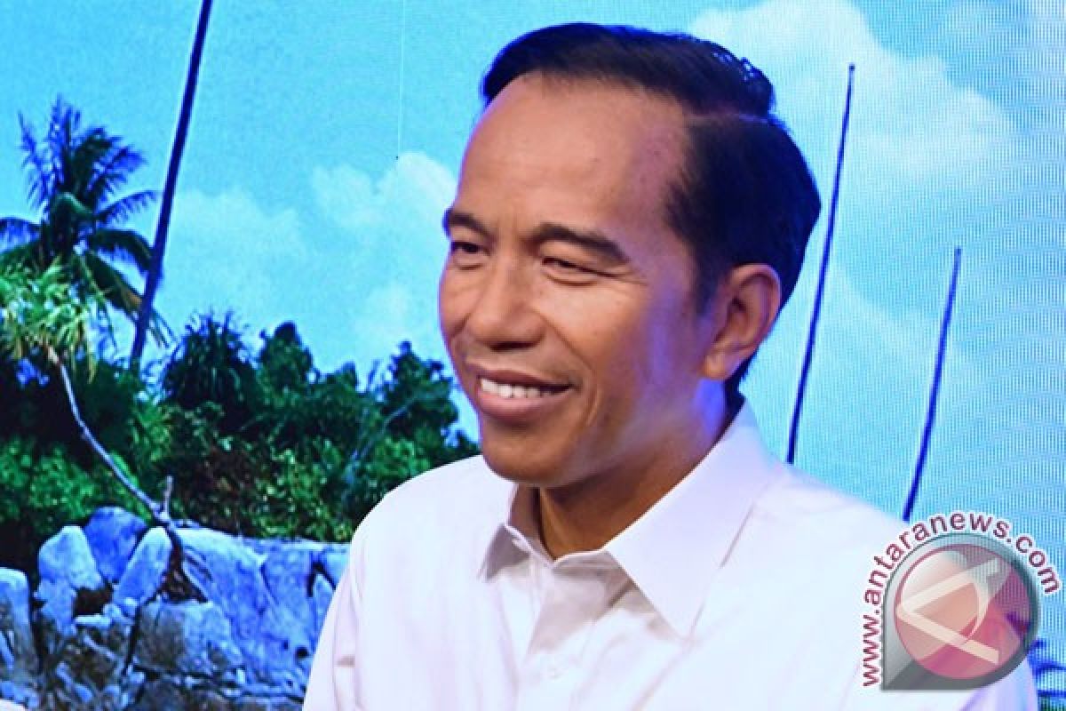 Patung Jokowi di Madame Tussauds ganti baju batik