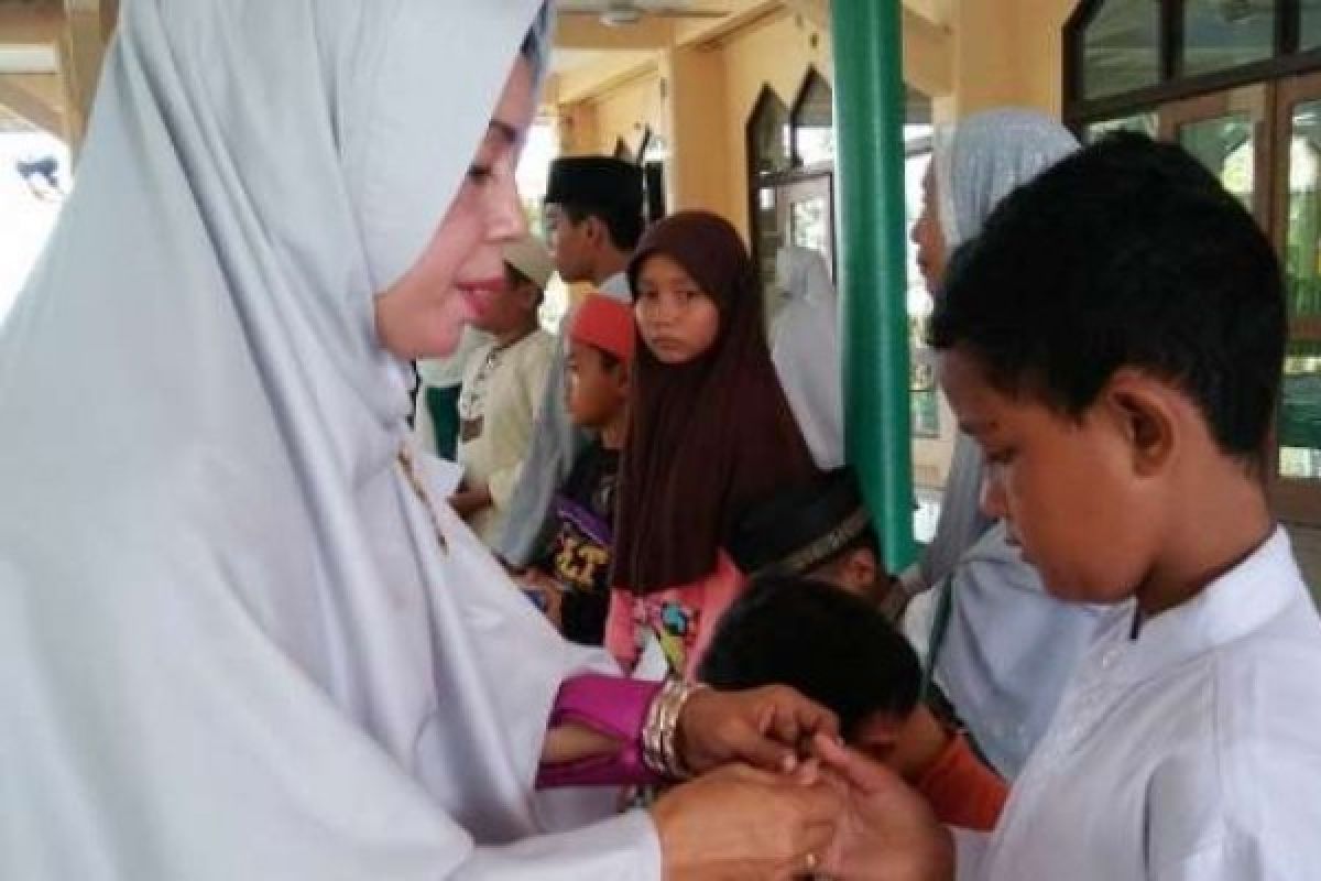 Jamaah Perwiridan Riau Kompleks Serahkan Bantuan Untuk Pelajar Pangkalan Kerinci