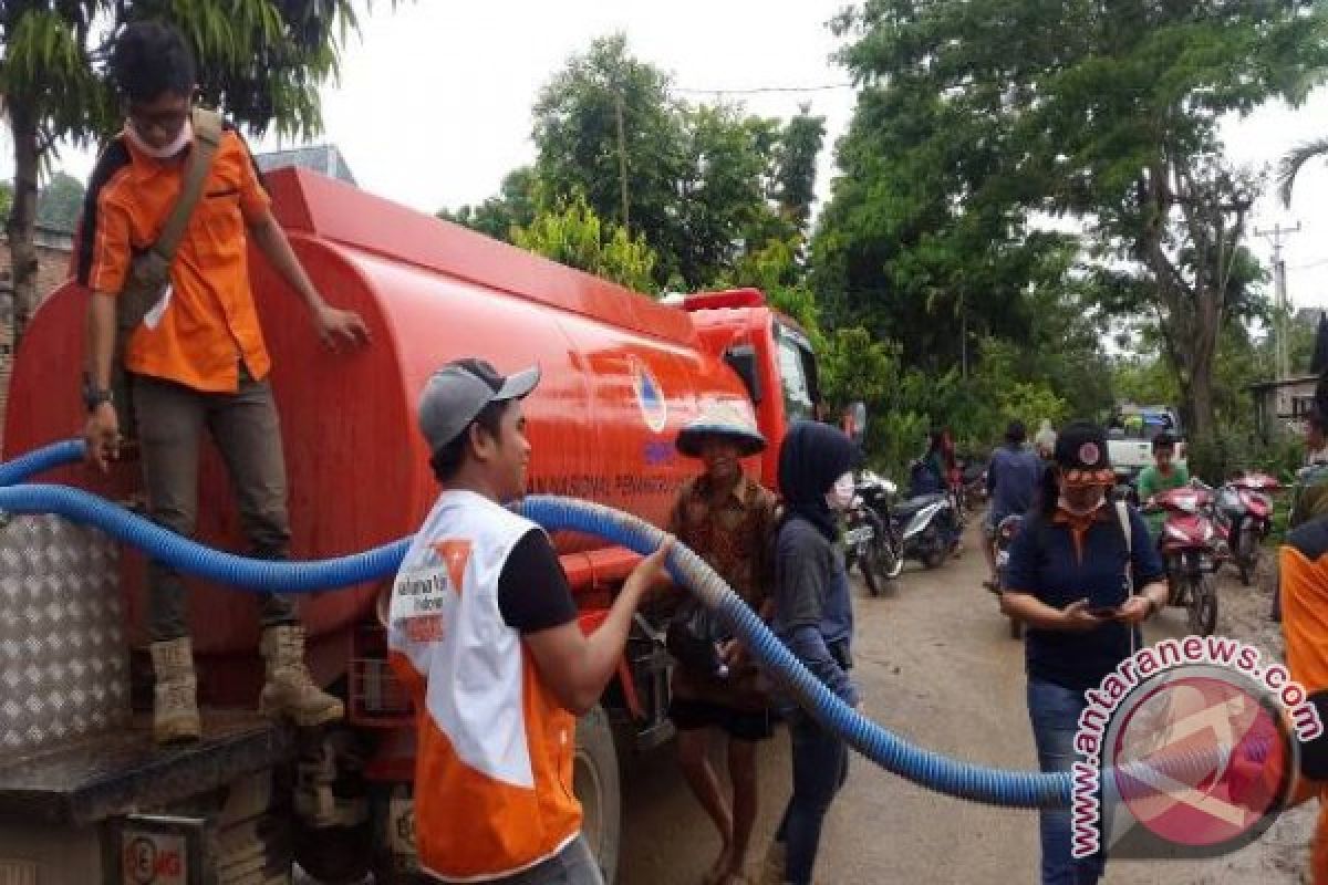 WVI-BPBD  distribusikan air bersih untuk korban banjir Tolitoli  