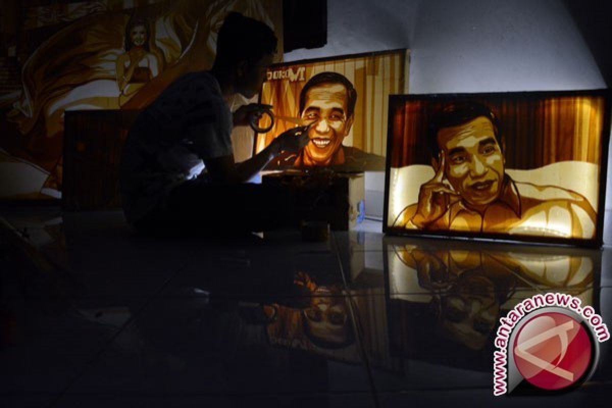 Seniman Dede Rai rampungkan lukisan Jokowi