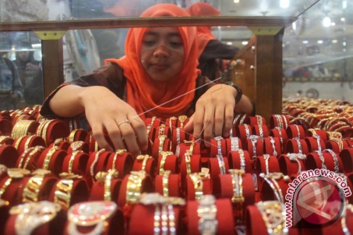 Harga emas turun lagi