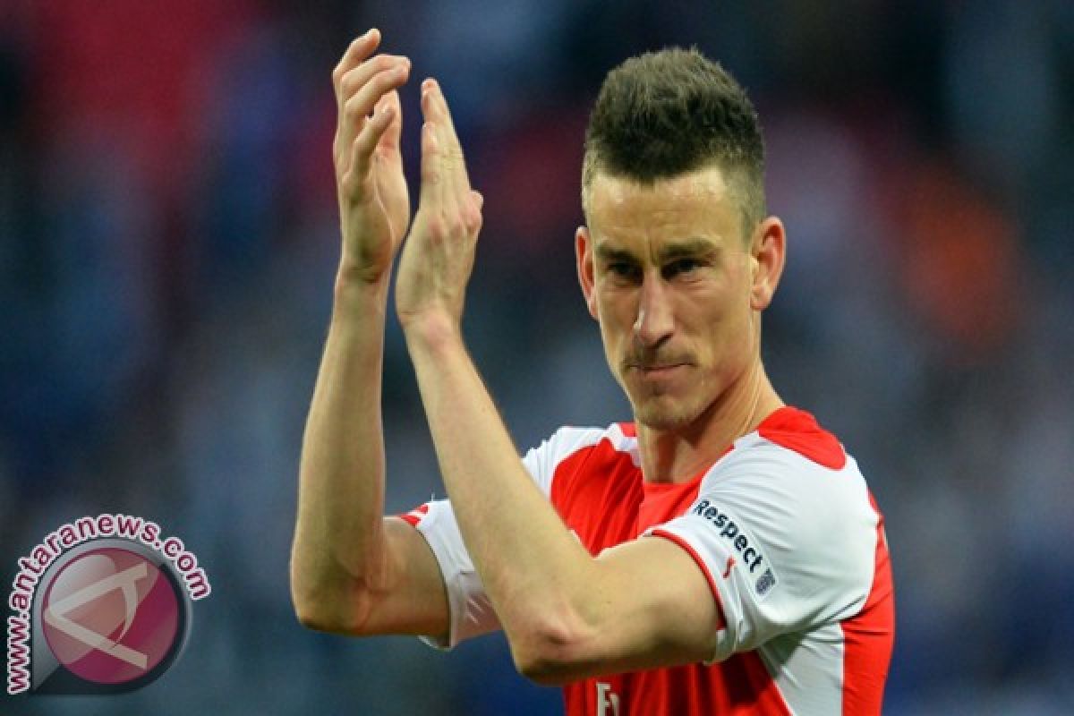 Koscielny sudah kembali tersenyum