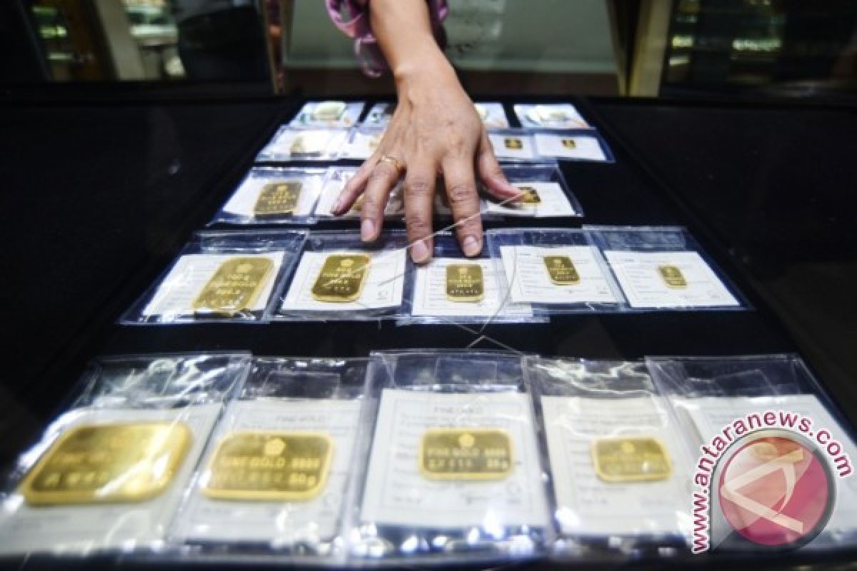 Emas Berjangka Menurun karena Dolar AS Stabil