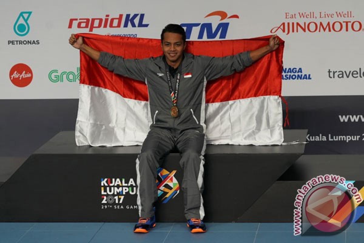 Asian Games (swimming) - Indonesia's Siman eyes medal in men`s 50m backstroke