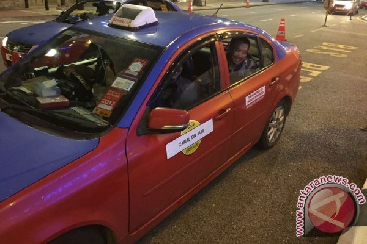 Kala Menpora keliling Kuala Lumpur dengan taksi