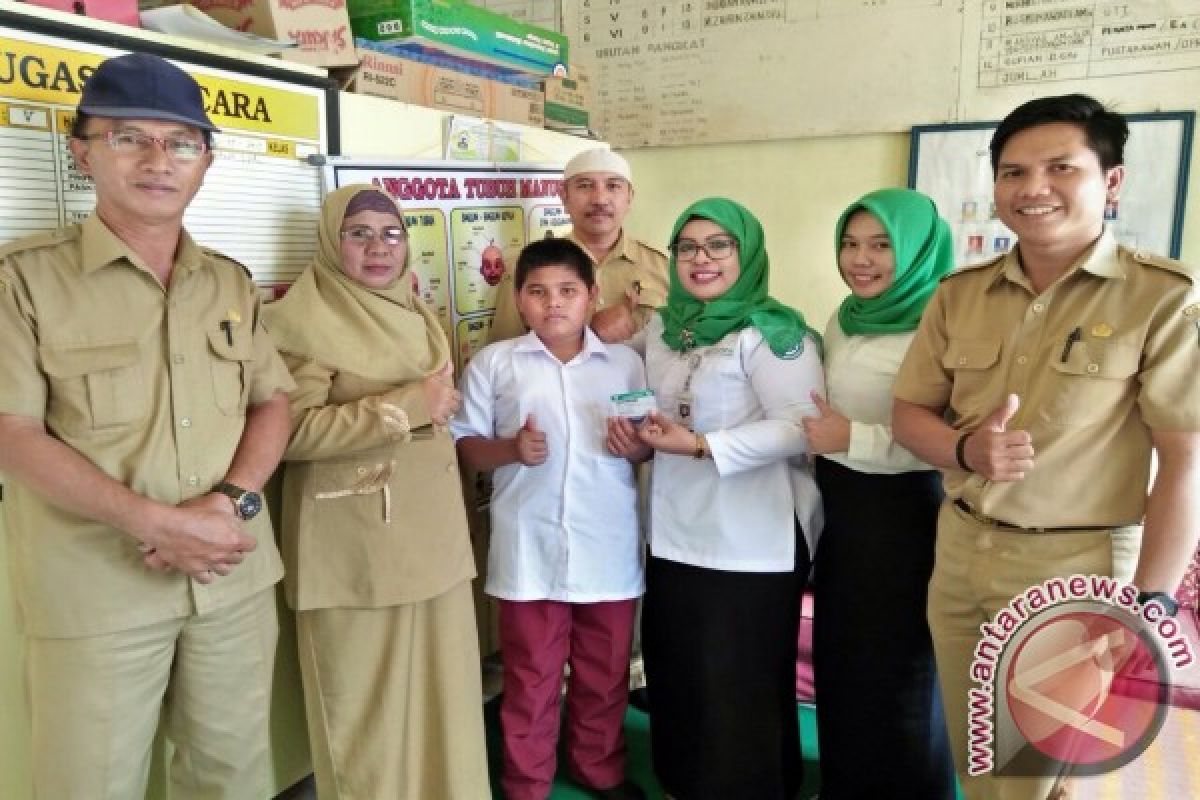 Keluarga Maswi Terima KIS Dari BPJS