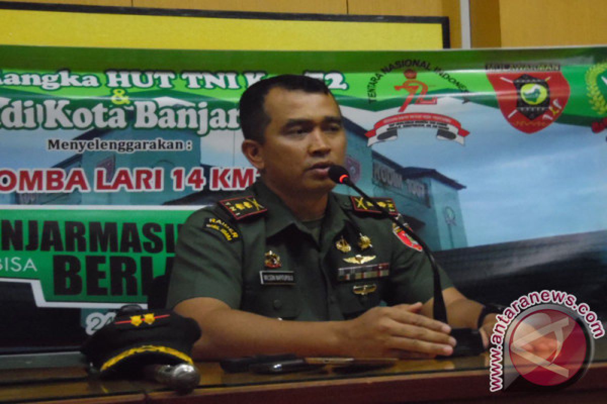 TNI Rintis Jalan Bermedan Gambut Sungai Gampa