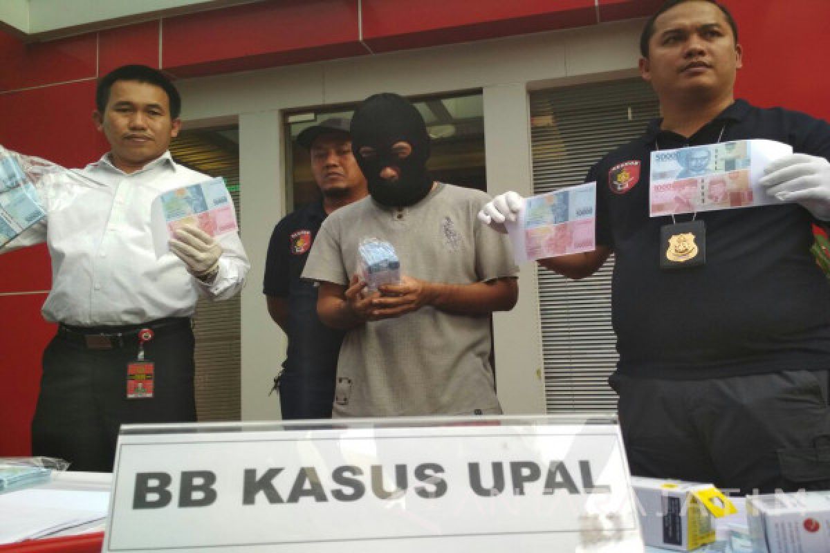 Polisi Bongkar Tempat Pembuatan Uang Palsu di Malang 