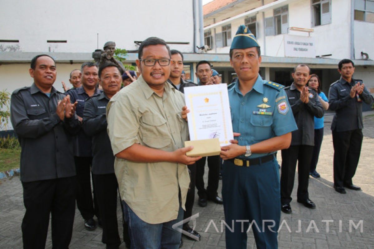 Pewarta Antara Jatim Juara Lomba Foto HUT TNI