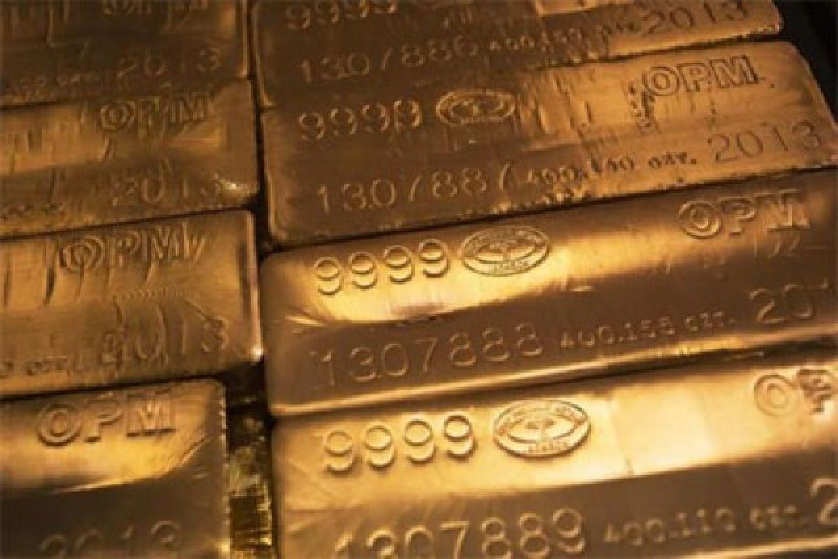 Emas berbalik naik setelah ekuitas dan dolar AS mundur 