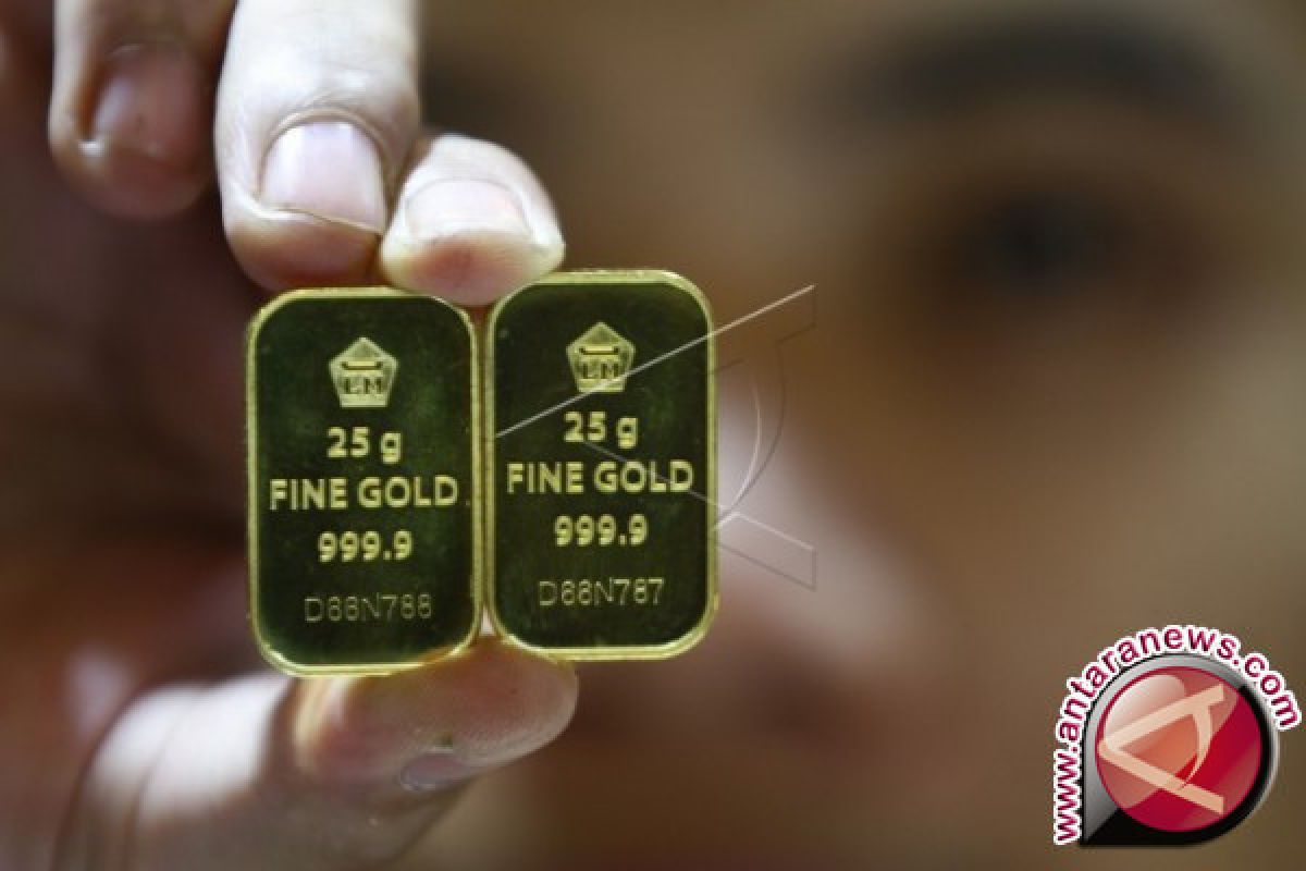 Harga emas berjangka turun karena aksi ambil untung setelah dolar AS menguat