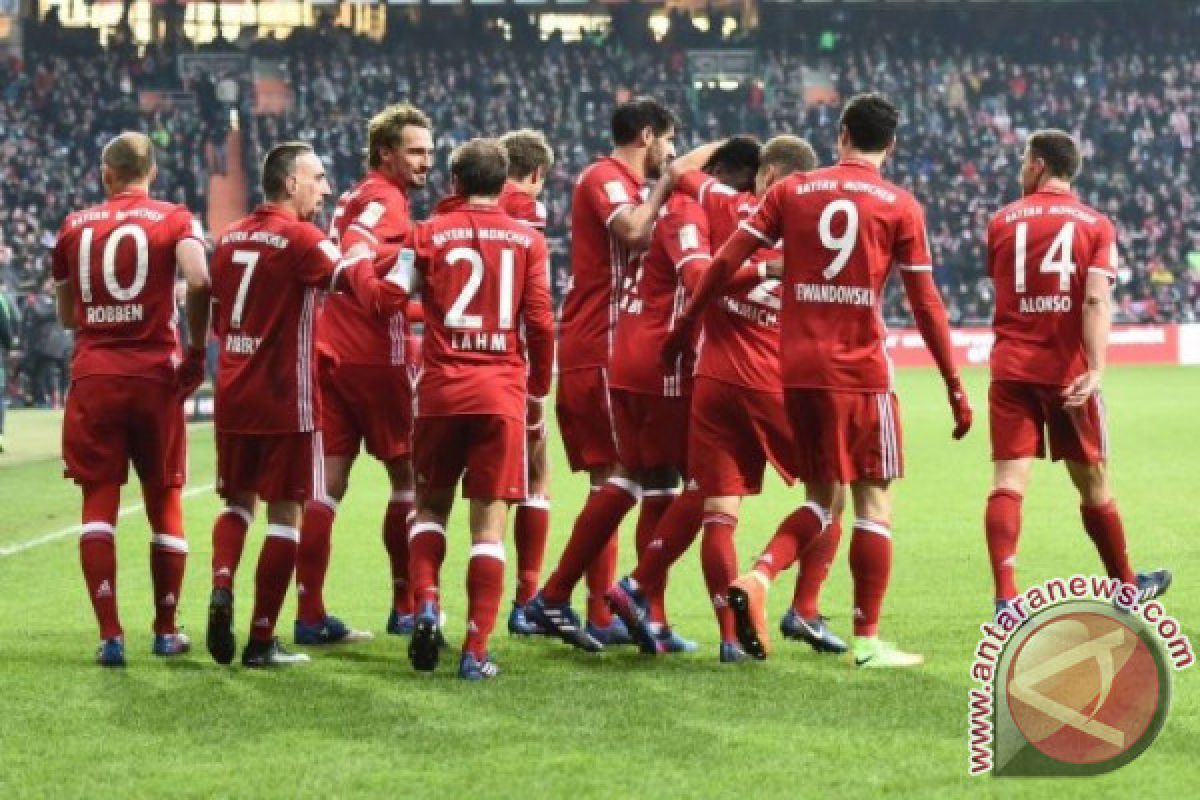 Bayern menang besar, Dortmund imbang lagi