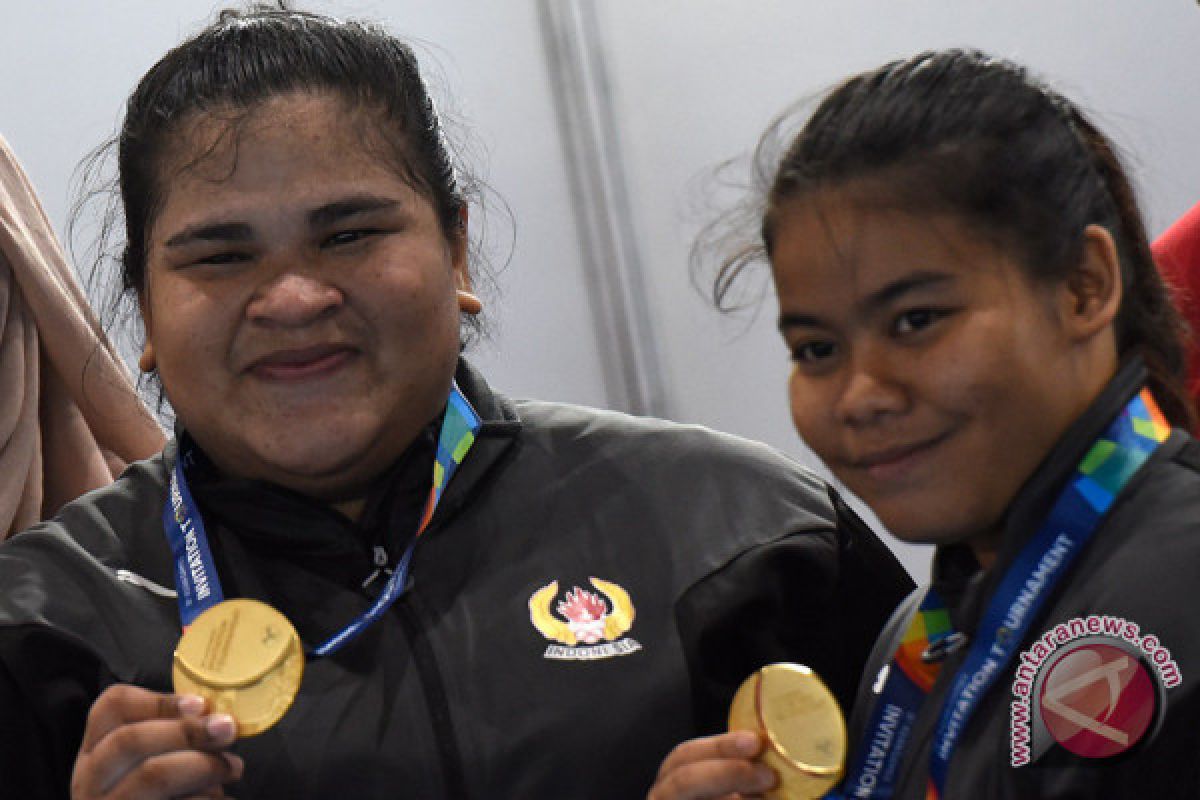 Pelatih angkat besi: emas dari Nurul dan Melinda mengejutkan
