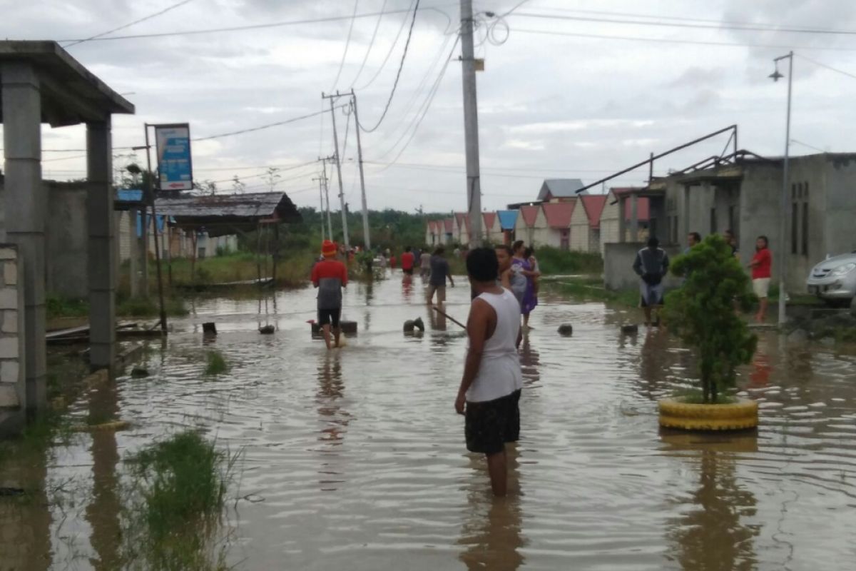 Warga korban banjir hentikan pembayaran angsuran  rumah