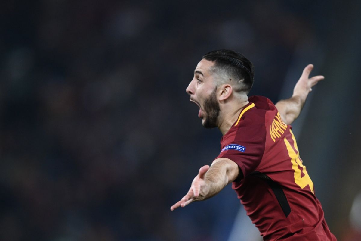 Pembalasan De Rossi-Manolas singkirkan Barcelona